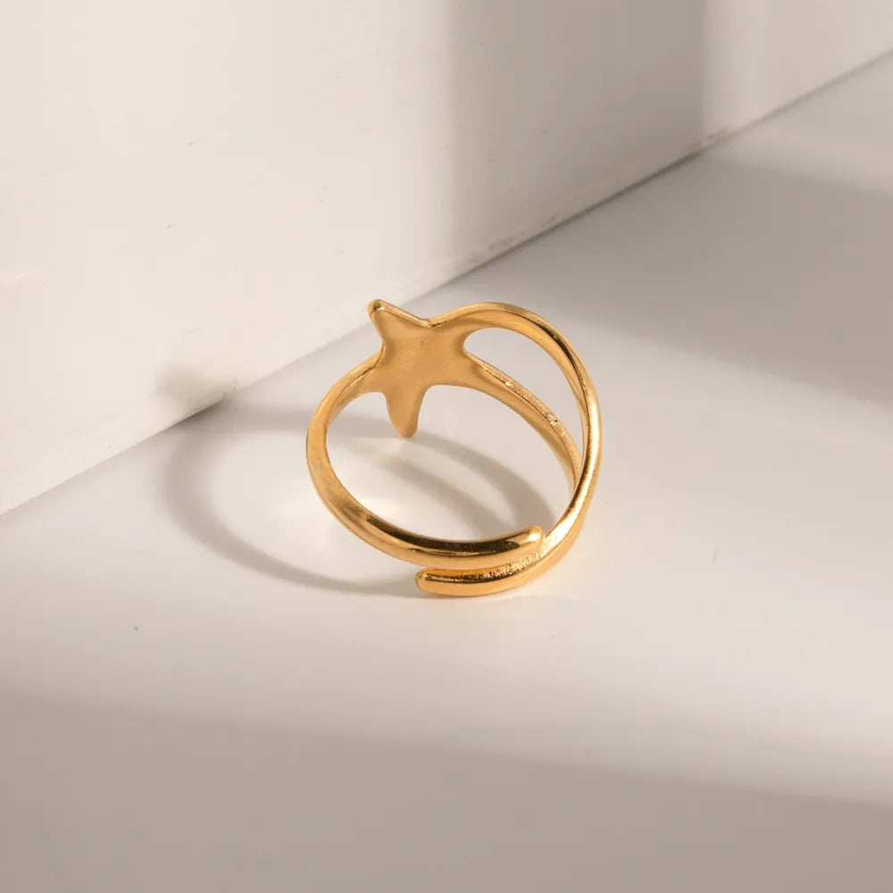 Anel estrela dourado minimalista para uso diario