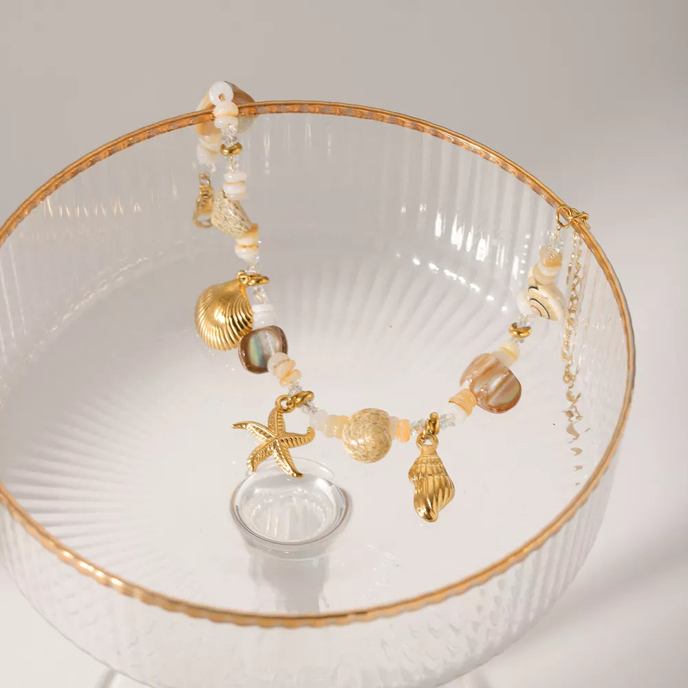 Pulseira concha dourada TRIX imagem 4 via fornecedor Trendsi