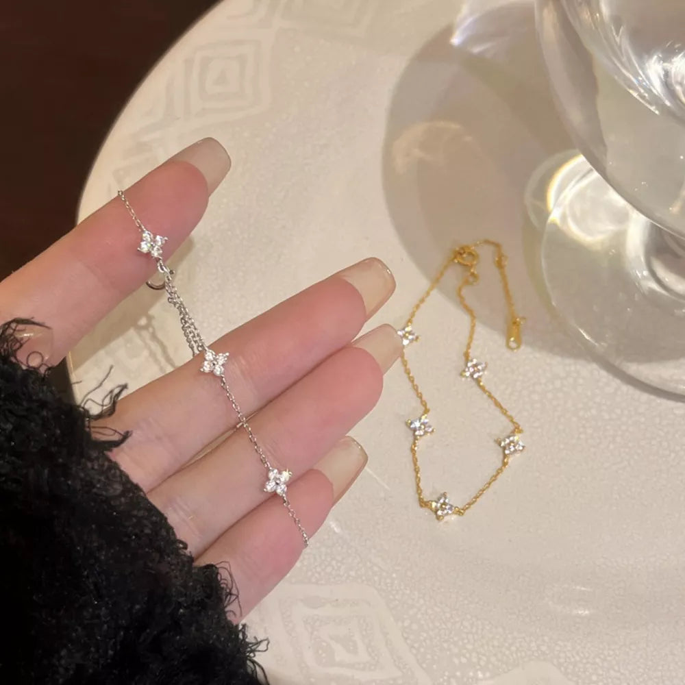 Pulseira Trevo Dourada TRIX imagem 1 via fornecedor Trendsi