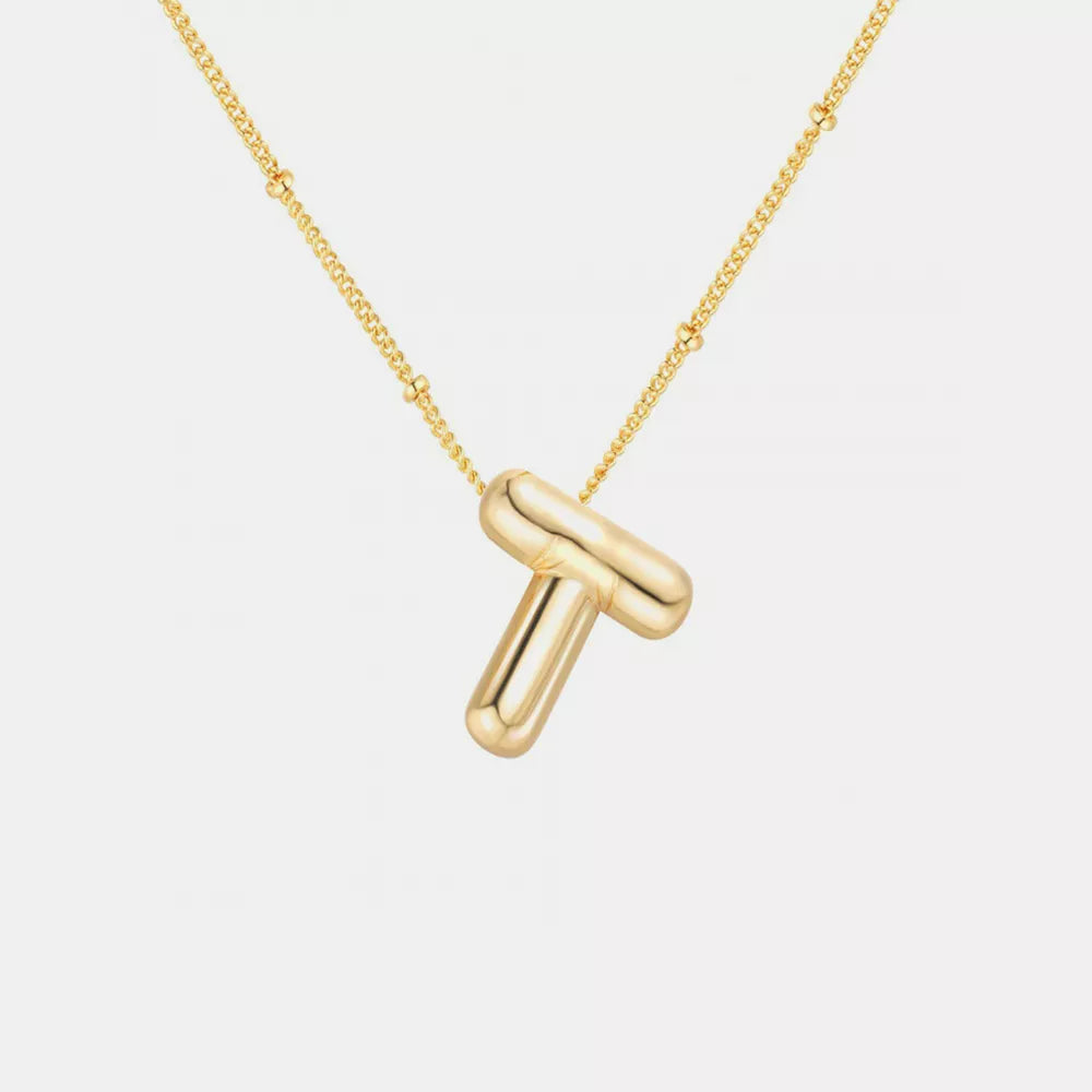 Colar Inicial T Dourado TRIX imagem 1 via fornecedor Trendsi
