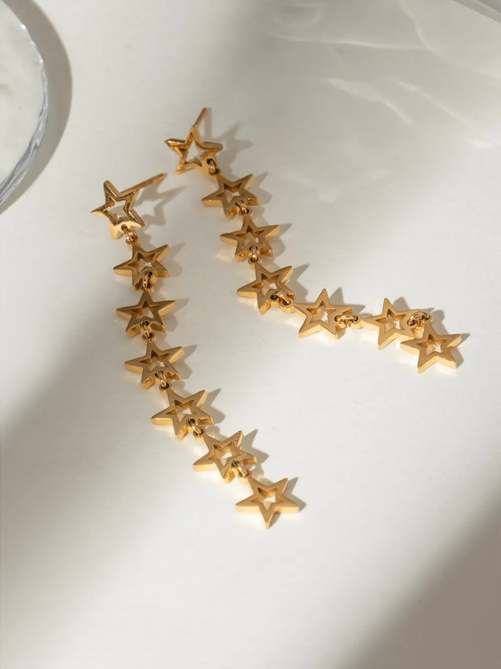 Brinco Estrela Dourado TRIX imagem 4 via fornecedor Trendsi