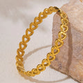 Pulseira Coracao Dourada 18K TRIX em composicao com pedra clara