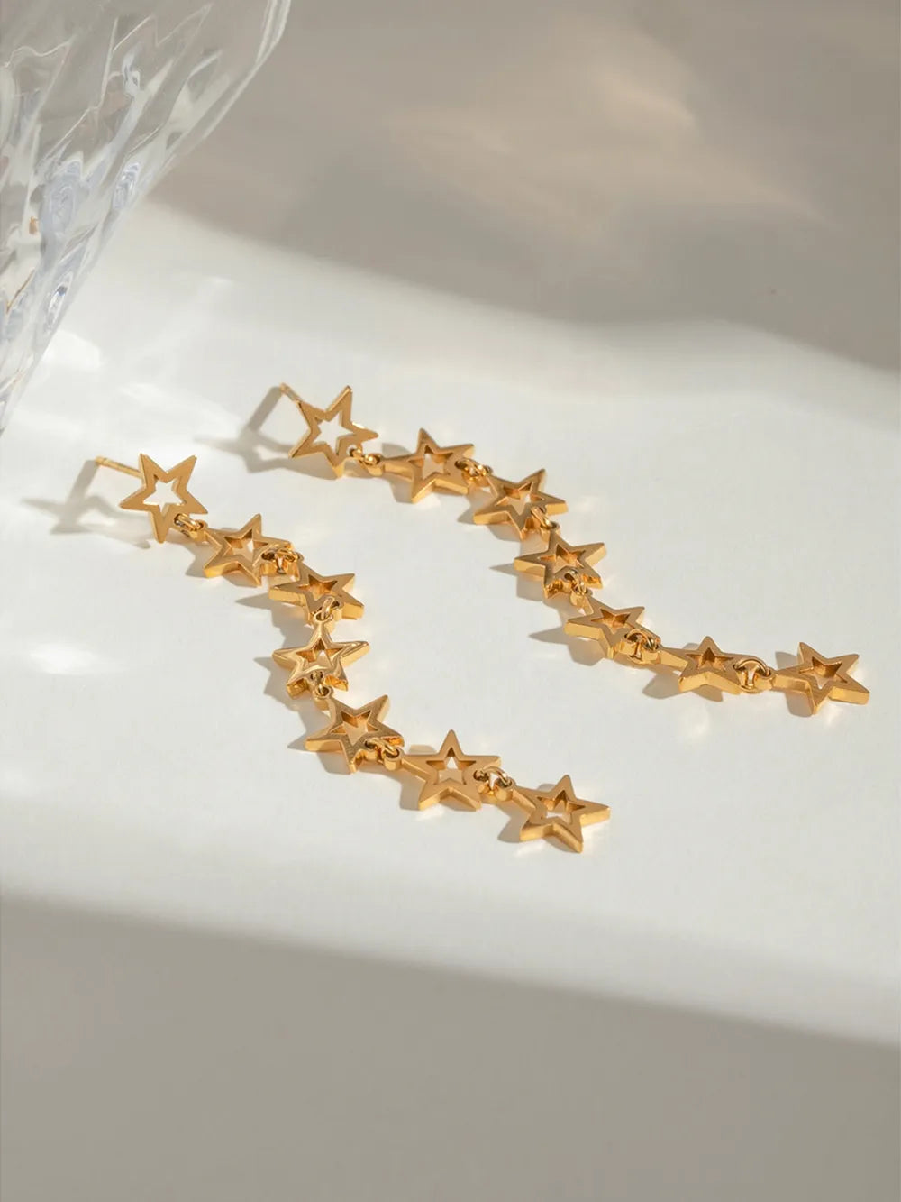 Brinco Estrela Dourado TRIX imagem 3 via fornecedor Trendsi