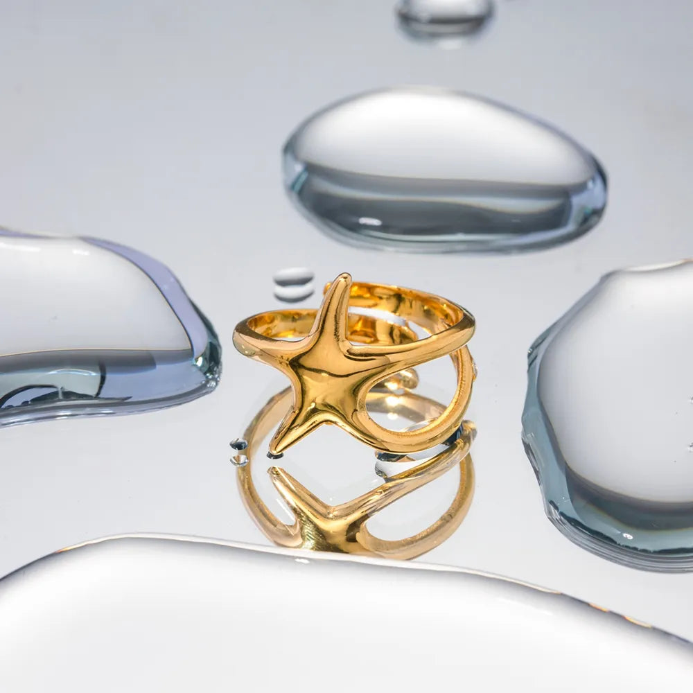 Anel estrela dourado 18K com brilho polido