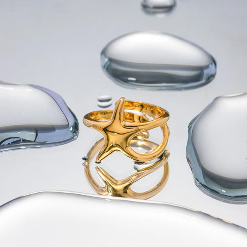 Anel estrela dourado 18K com brilho polido