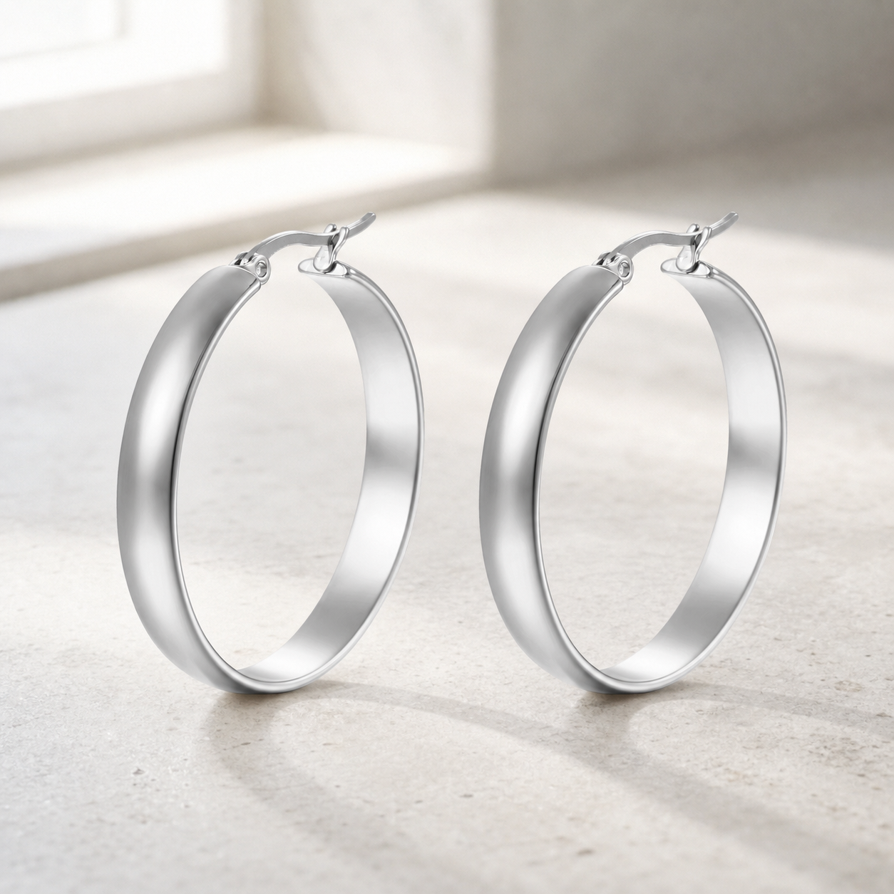 Silver-tone rounded hoop earrings product view