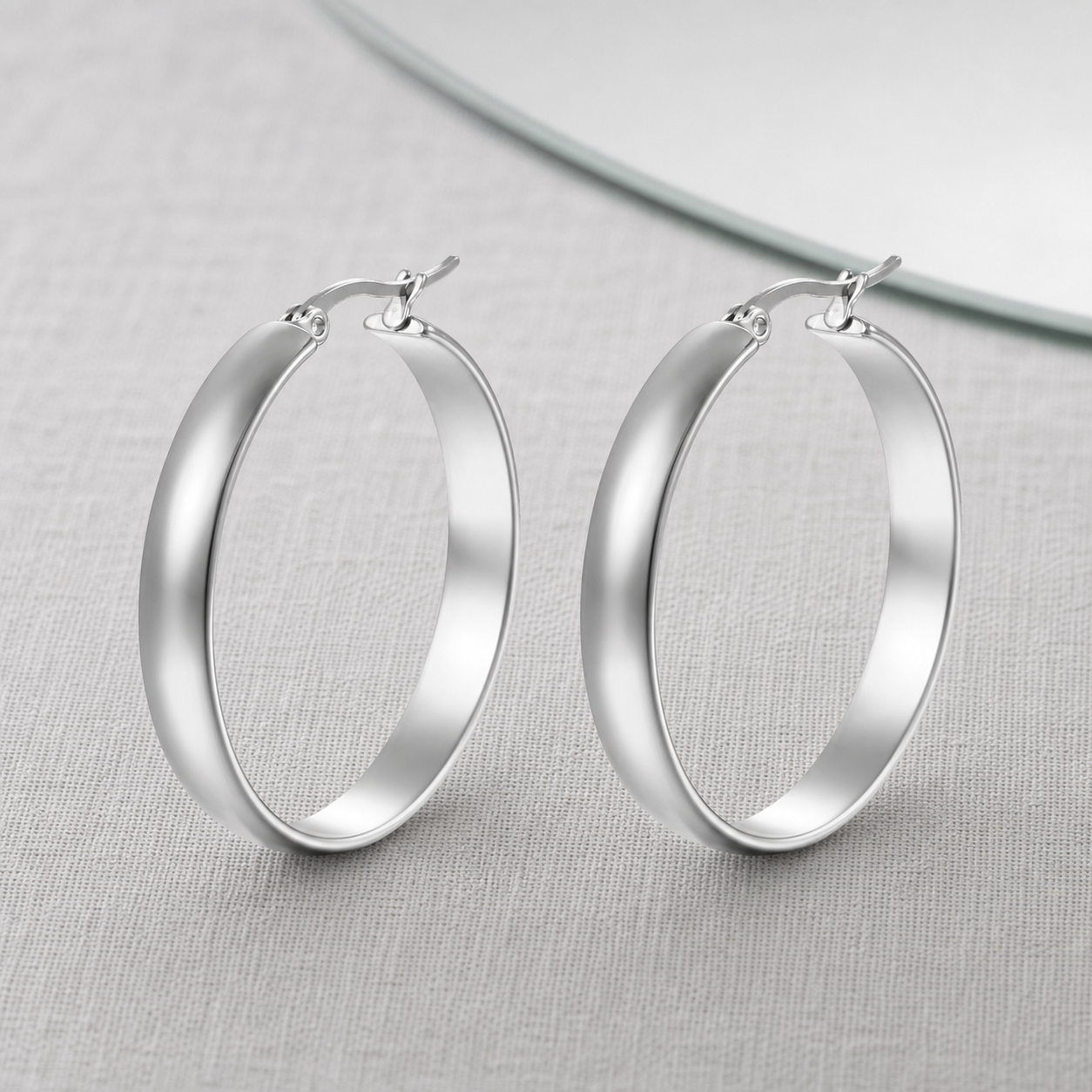 Silver-tone rounded hoop earrings product view