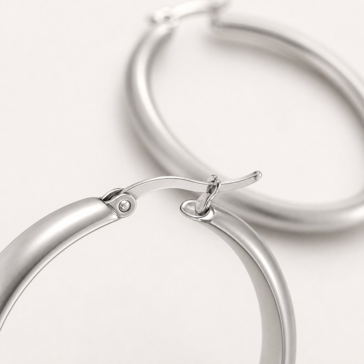 Silver-tone rounded hoop earrings product view